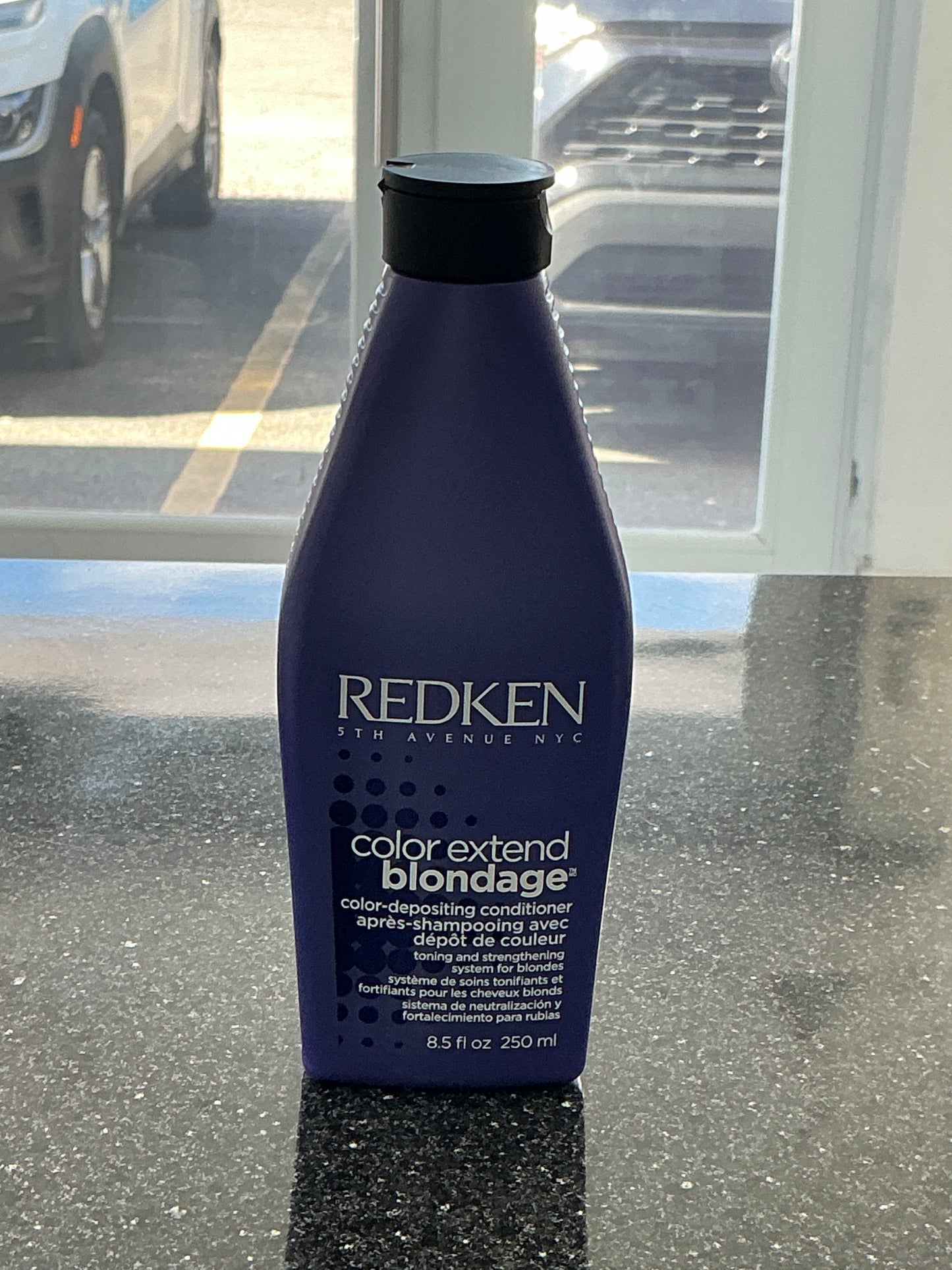 Conditioner color-depositing Redken